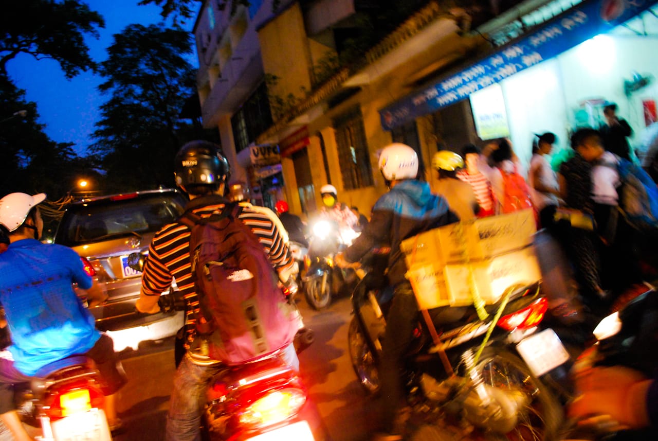 Morning ride to hotel in Hanoi, from the back of a motorbike. All photographs by the author.