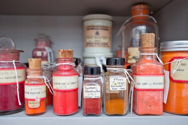 The pigments in the collection come from all over the world, and some are stored in their original delicate glass containers. Photo: Zak Jensen.