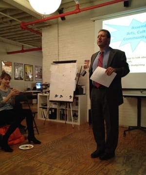 Brad Lander addresses audience at participatory budgeting meeting.