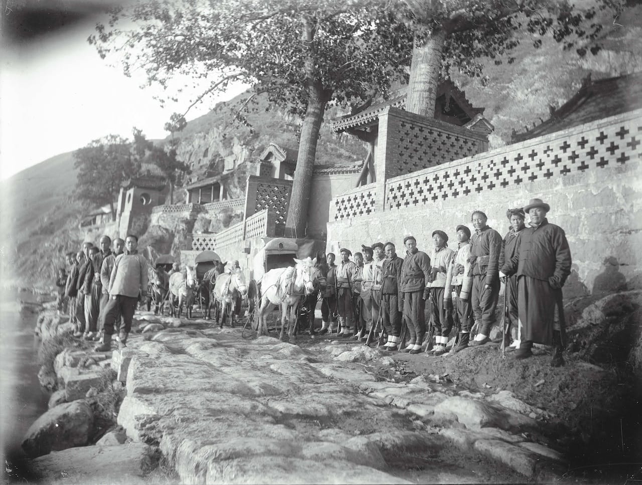 Longmen, Freer’s Chinese assistants along the riverbank, November  12, 1910  Yütai (active early 20th century)  Silver gelatin photographic print; H x W: 15.6 x 20.7 cm  Charles L. Freer Papers, Freer Gallery of Art and the Arthur M. Sackler  Gallery Archives, FSA A.1 12.5.GN.088 