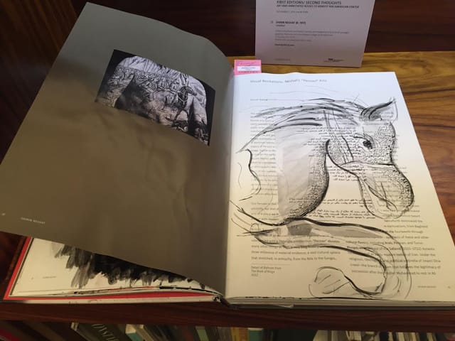 Shirin Neshat, "Untitled" (Graphite, ink and paper collage on printed book) (2014) (all photos by author) 