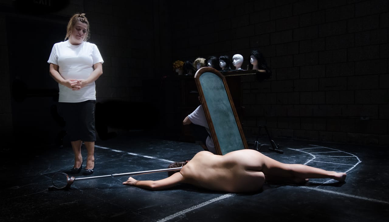 Rita Oliveira, Sofia Ortega (partially visible behind mirror), and Isabel Sanchez (floor) in 'The Maids' The Maids'