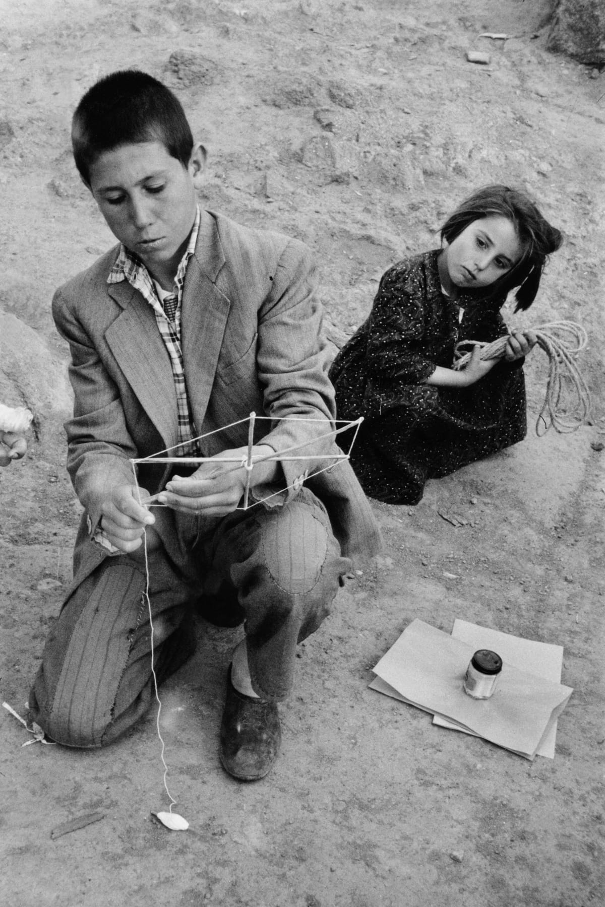 Marc Riboud (French, b. 1923)  Preparing Kites on a Sunday Morning  Ankara, Turkey, 1955 Vintage print  17 x 25.3 cm. 