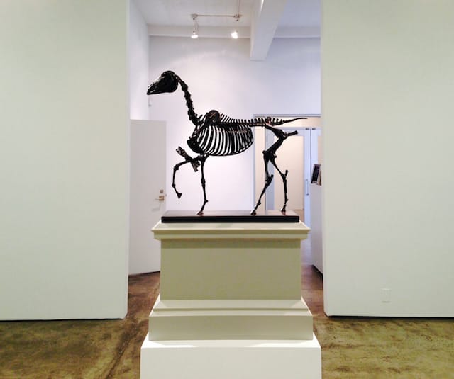 Hans Haacke, “Gift Horse, Model for Fourth Plinth, Trafalgar Square, London” (2013). Bronze and electroluminescent film; sculpture: 18 1/8 x 16 x 6 1/4 inches; plinth: 13 x 8 1/2 x 18 in.; overall: 30 1/2 x 8 1/2 x 18 inches. Edition 2 of 6; 1 AP. Fabricated by Julia and Shane Stratton. (all images by the author for Hyperallergic)