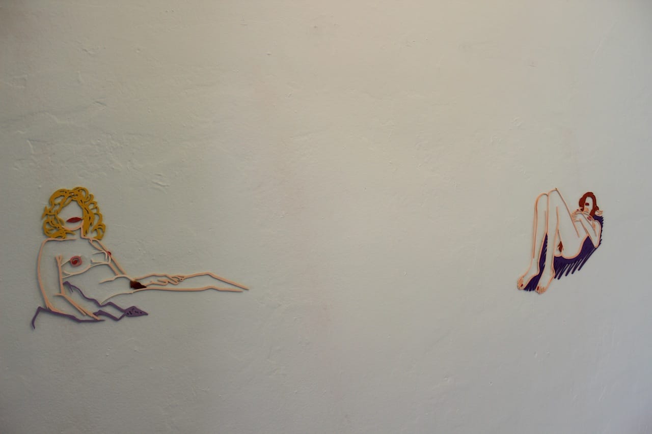 Tom Wesselmann, “Blonde on Blanket” (1985-98) and “First Rosemary” (1990), in the Carl Solway Gallery booth