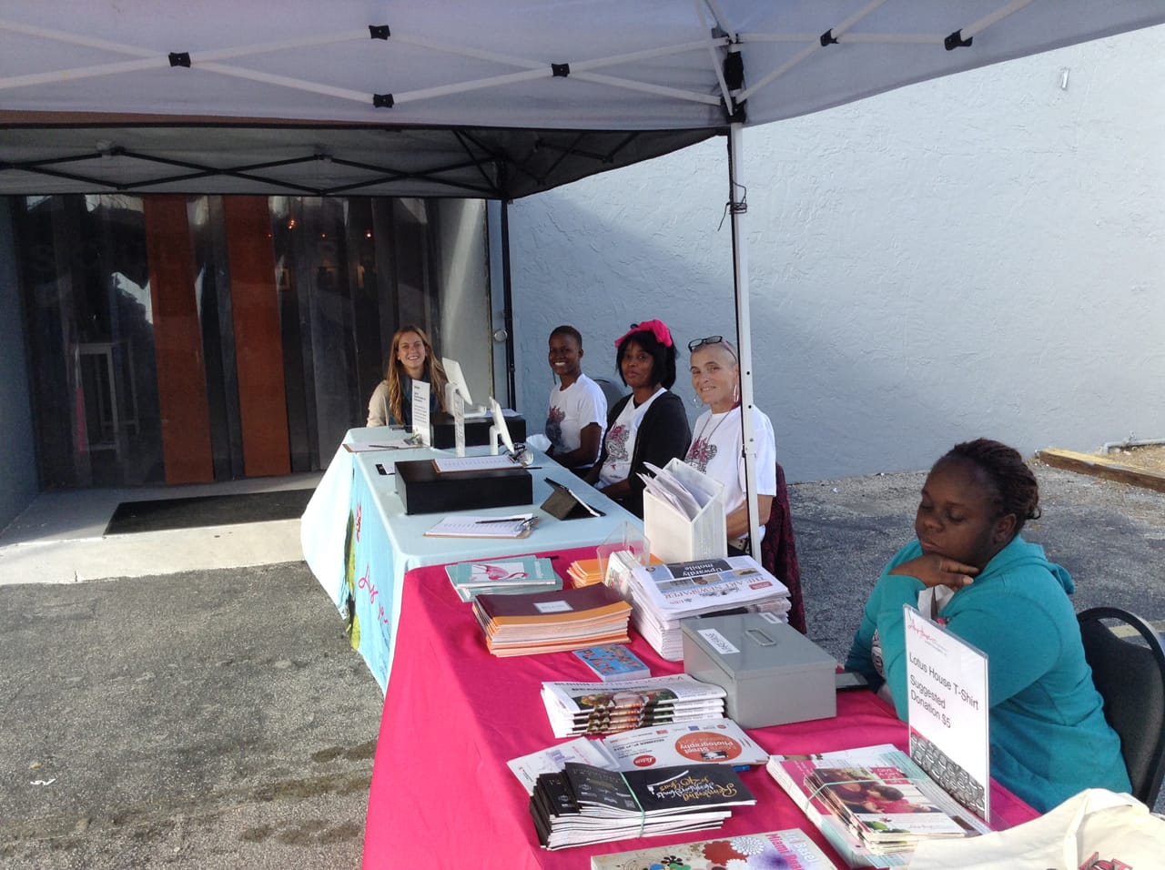 Women from Lotus House at the entrance to the Margulies Collection