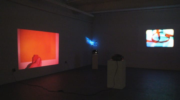 “Slide Slide Slide” exhibition (installation view with works by Michael Snow, Bradley Eros, Bruno Munari) (via Microscope)