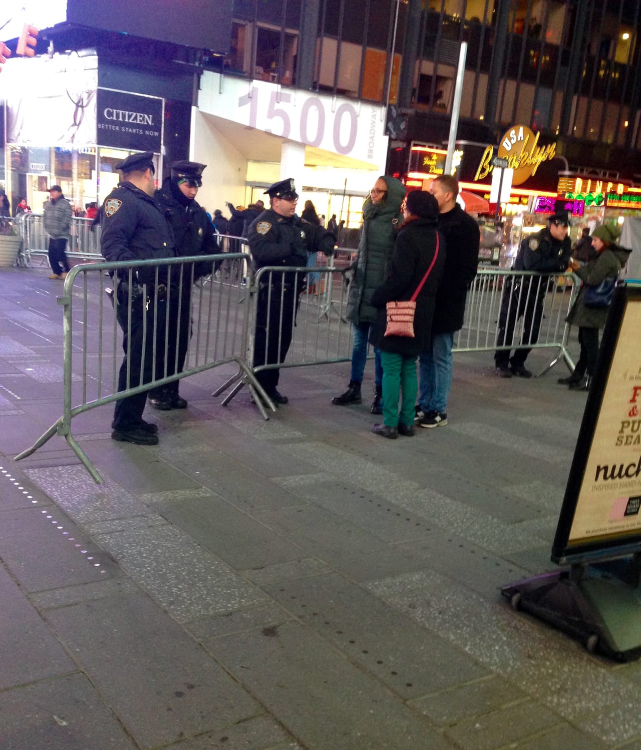 One Willing Participant group engaging policemen on West 43rd Street and Broadway (all photos by the author for Hyperallergic)