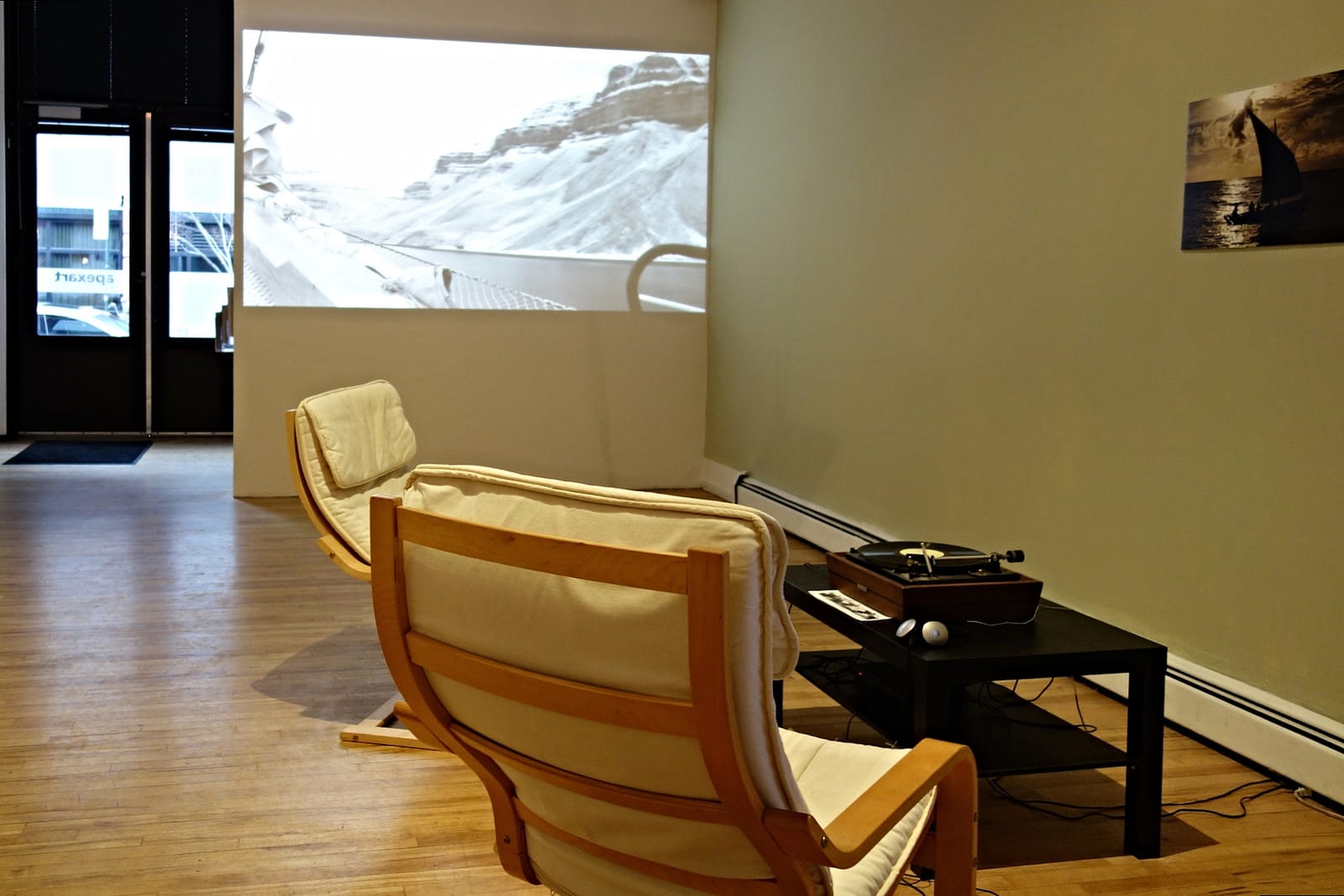 Installation view of 'Foot Notes,' looking to Ed Osborn's "Long Approach" (2012) (photograph by the author for Hyperallergic)