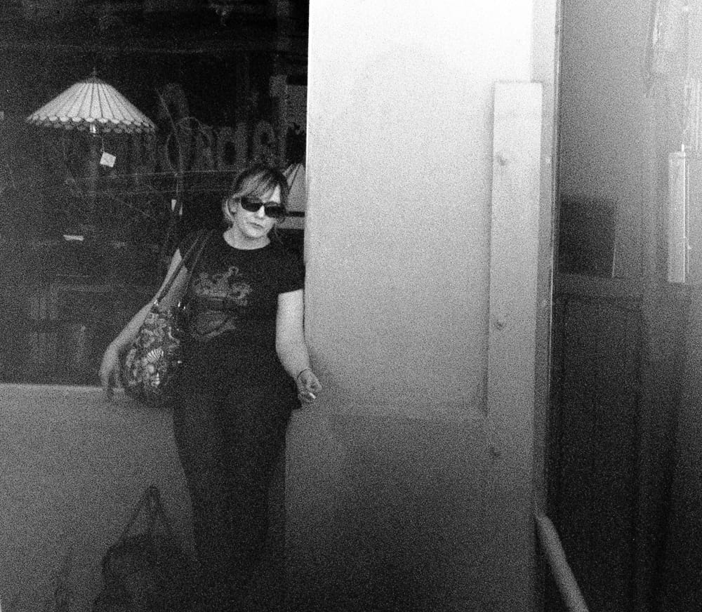 Jessamyn Lovell, "Surveillance (smoking)" (2013), from 'Dear Erin Hart,': "We followed Erin Hart for a few blocks before she got on a bus headed to 12th and Van Ness, a busy intersection in downtown San Francisco on the border of SOMA and the Mission District." (click to enlarge)