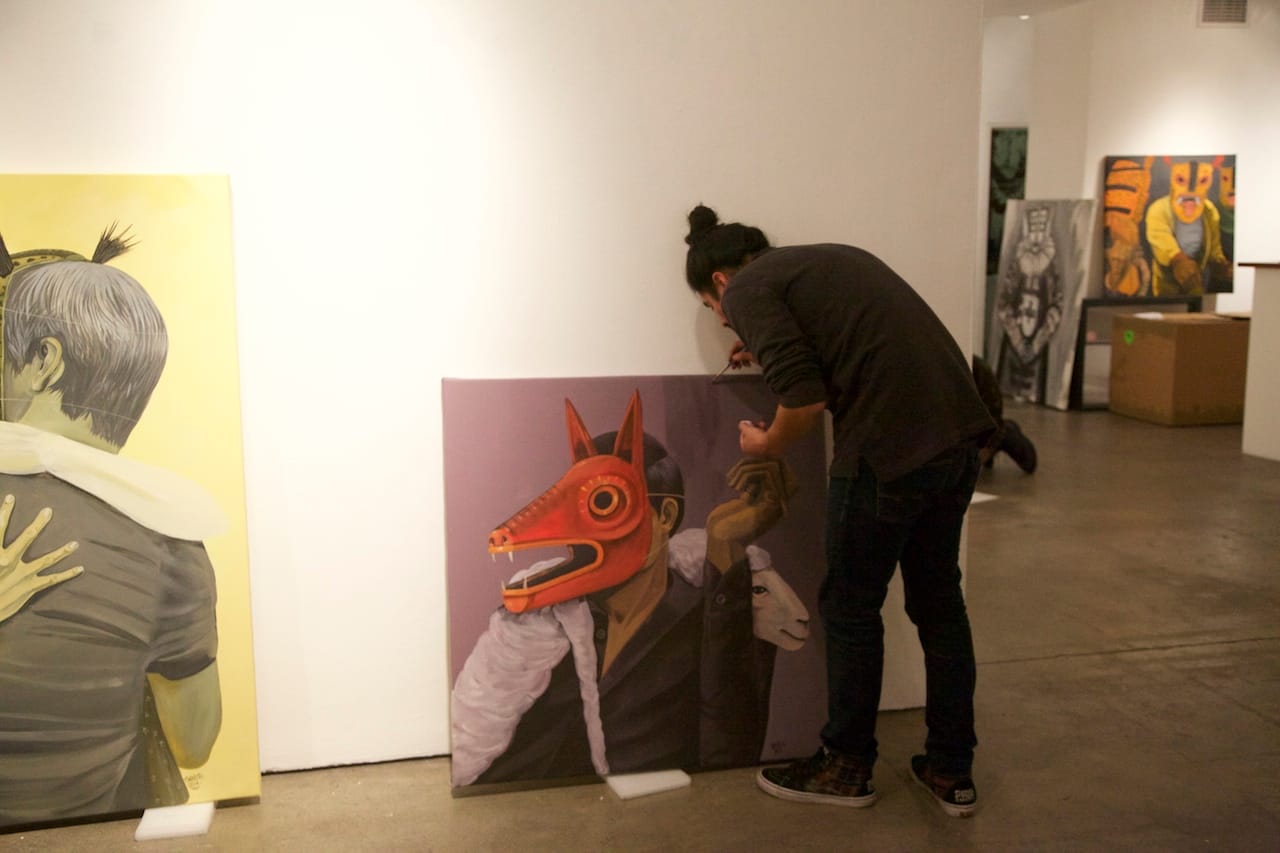 Saner putting the finishing touches on one of the pieces in 'Primitivo' at Jonathan LeVine Gallery