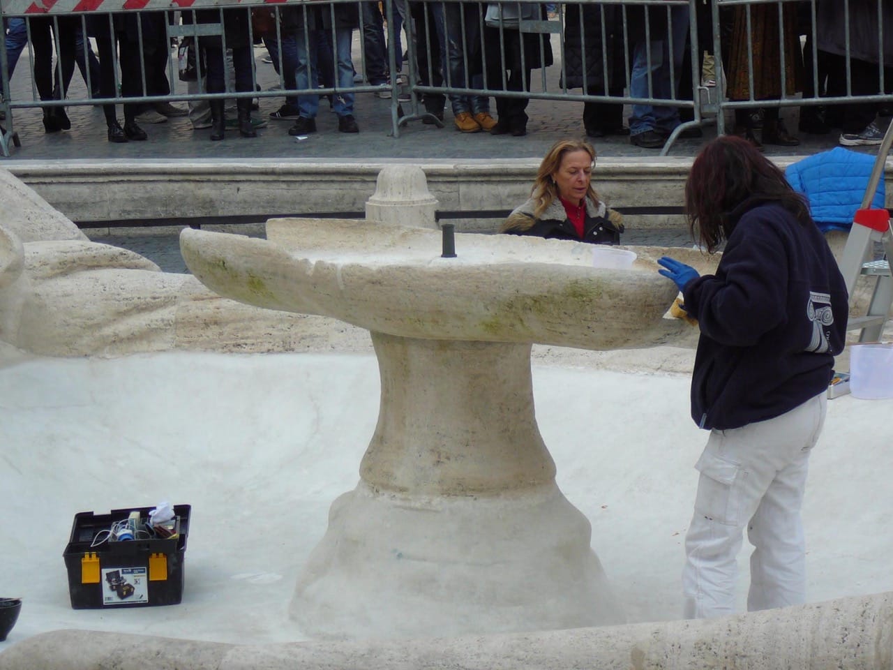 Restorers working on the fountain today (click to enlarge)