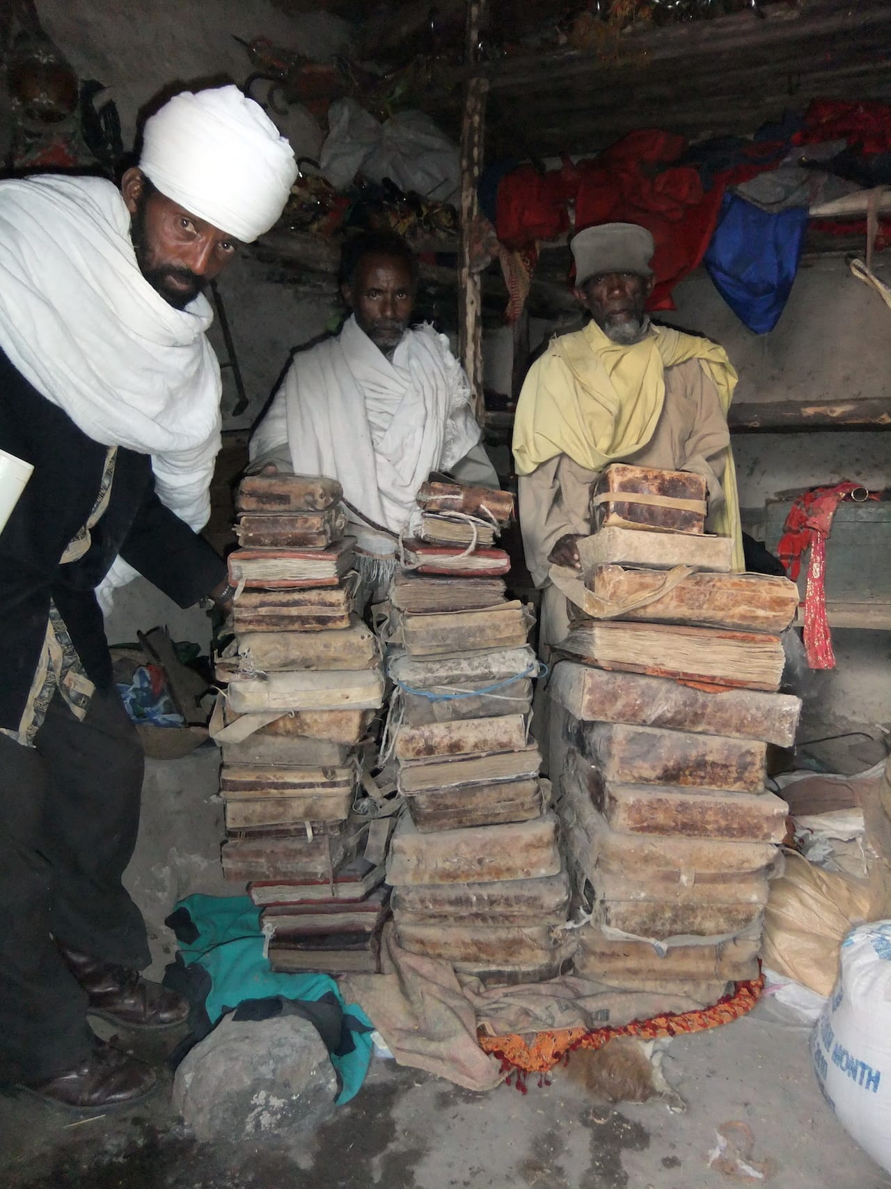 The priests of May Wäyni monastery with their manuscripts, Ethiopia. Endangered Archives Programme. Photography © Professor Michael Gervers - See more at: http://www.bl.uk/press-releases/2015/february/endangered-archives-programme-10-years#sthash.j314FaWj.dpuf