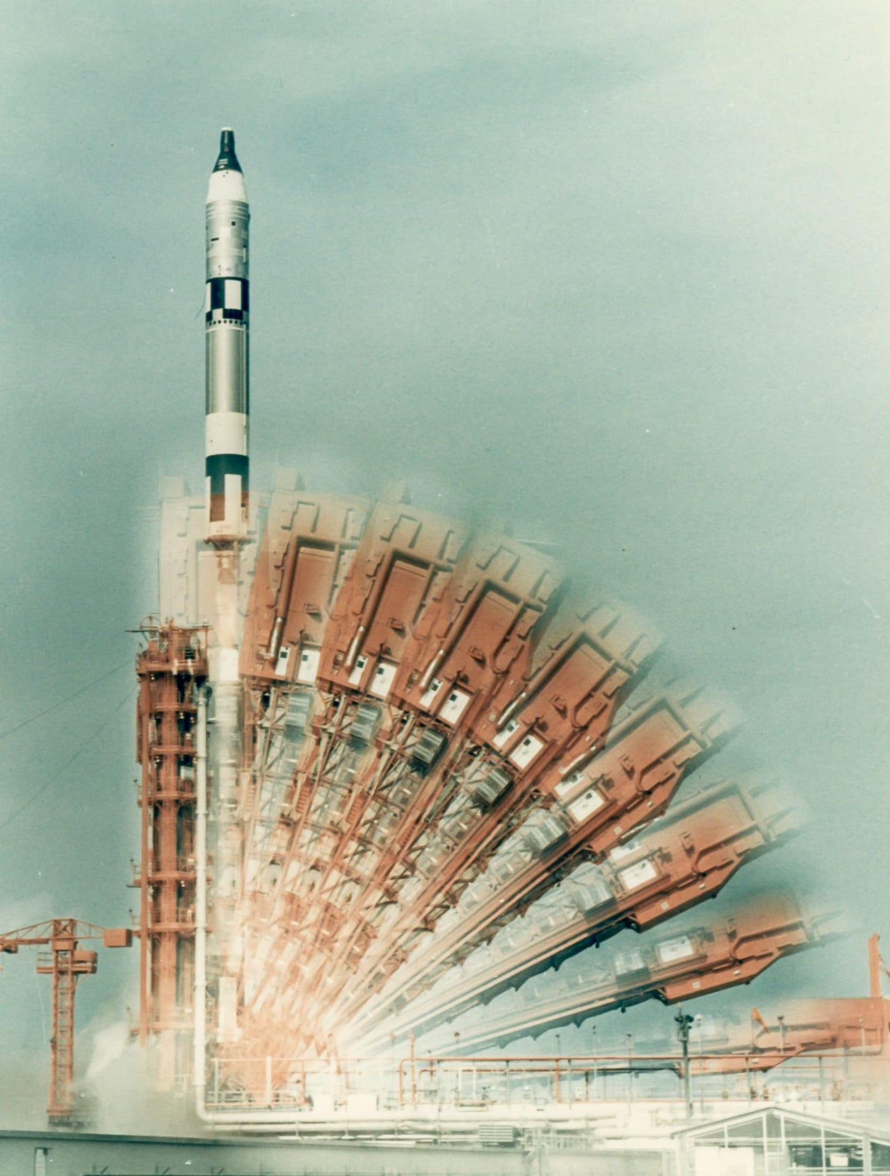 Time-exposure of Gemini 10 launch, July 1966 Vintage chromogenic print on fibre-based Kodak paper, 20.3 x 25.4cm (8 x 10in), “A Kodak Paper”  watermark on verso, numbered NASA S-66-42762 in red in top margin A time-exposure creates the illusion of multiple rocker arms. Onboard were astronauts John Young  and Michael Collins, command pilot and pilot, respectively. Est. £200-300