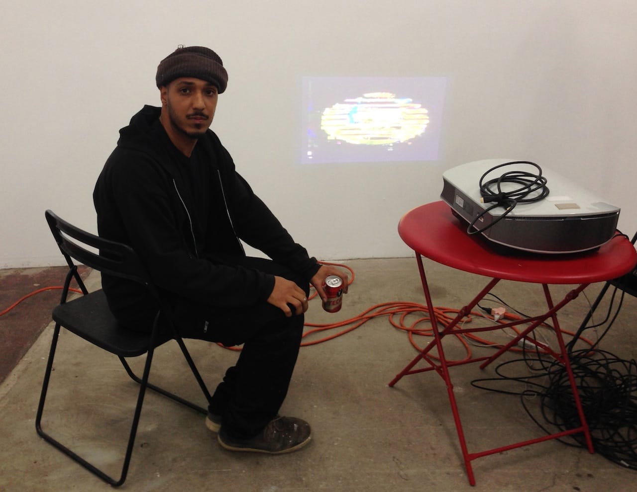 Curator Kelman Duran with Gif art by Simon Pecco.