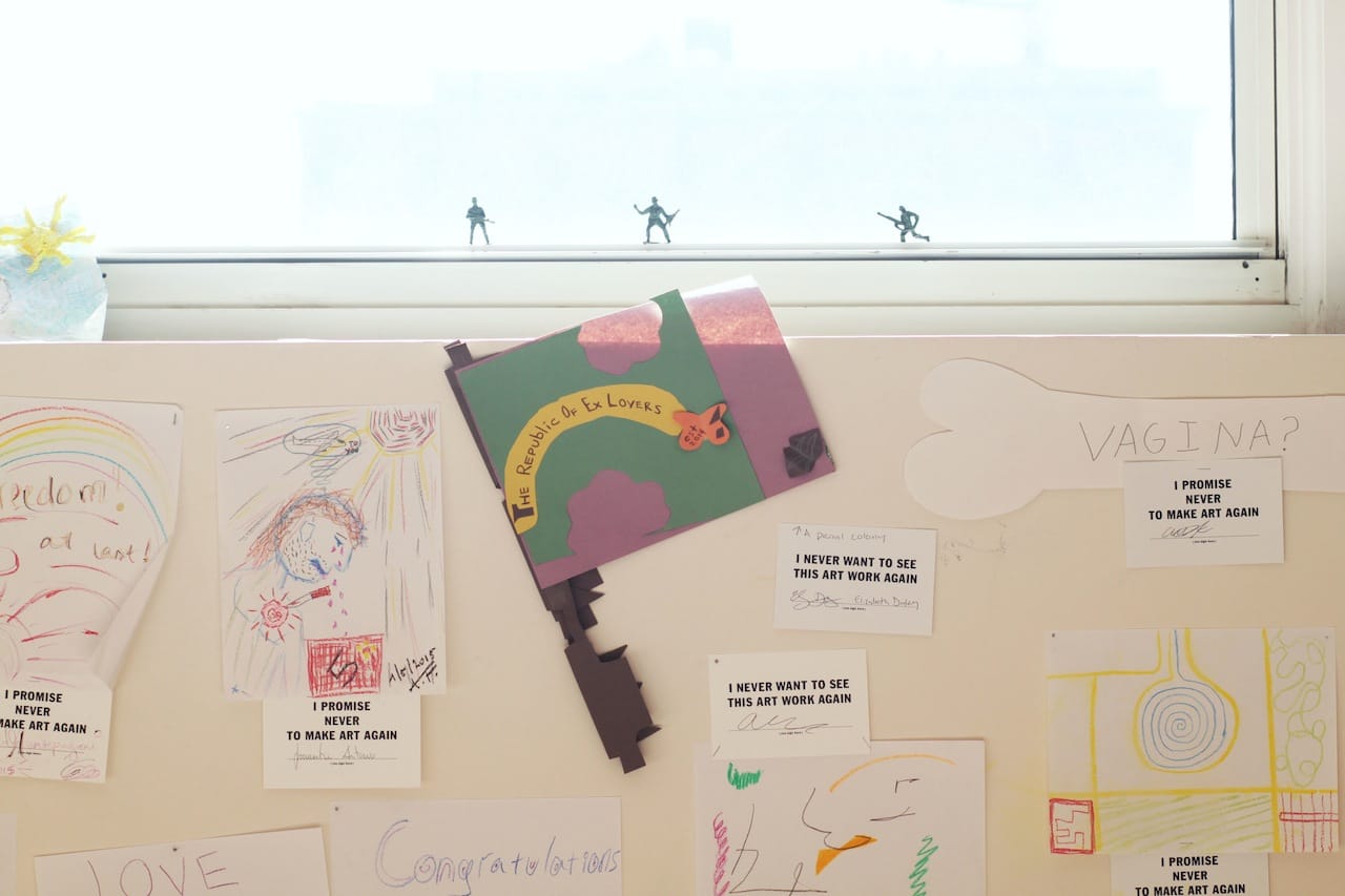 Toy soldiers are strewn about the exhibition, highlighting the sense of play.