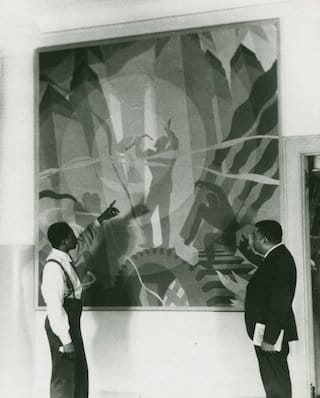 Artist Aaron Douglas (on the left) and Schomburg Collection curator Arthur A. Schomburg, examine Douglas's painting "Aspects of Negro Life: Song of the Towers" (1934) (via nypl.org)