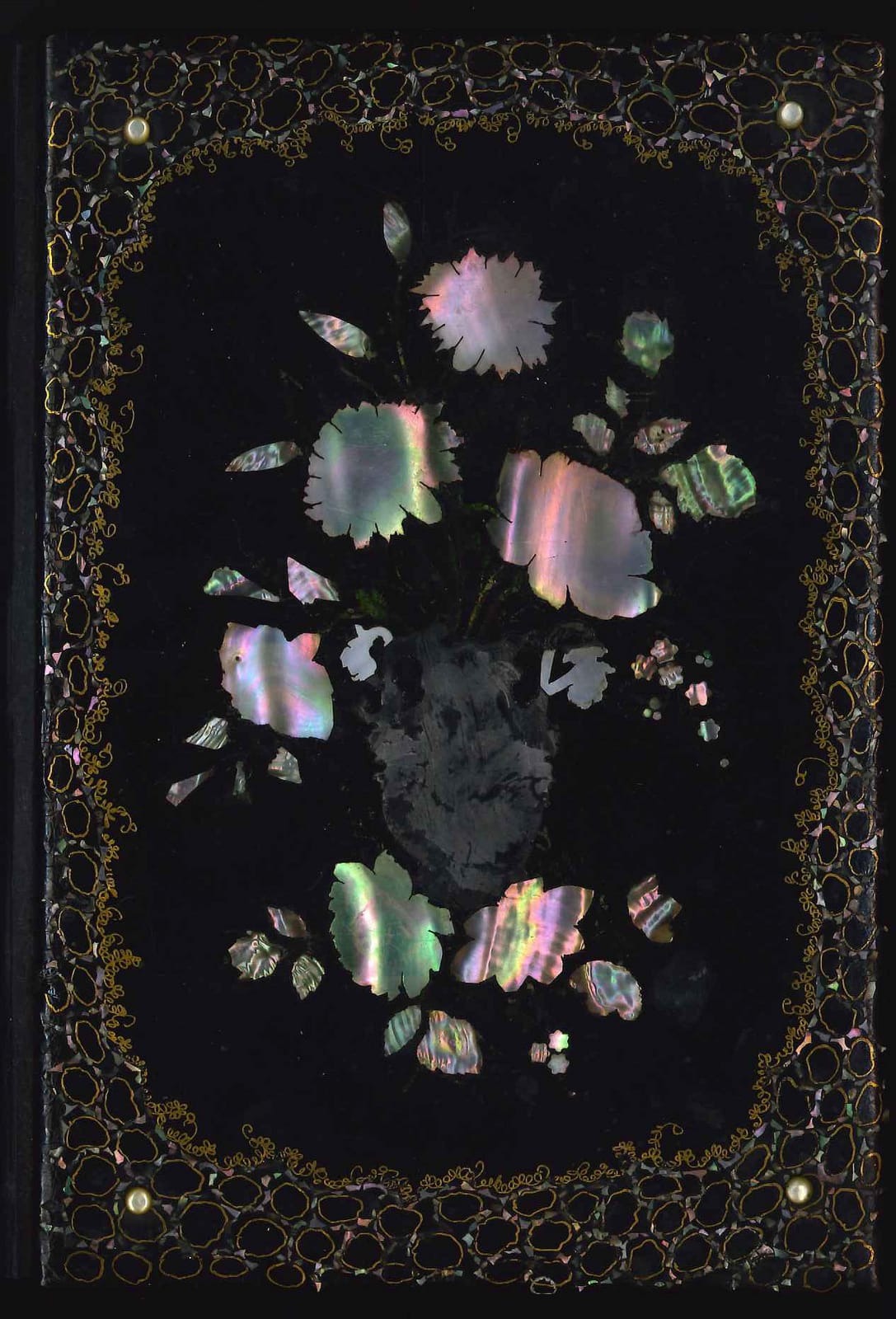 Cover of a book inlaid with mother of pearl (via Library Company Conservation Dept.)