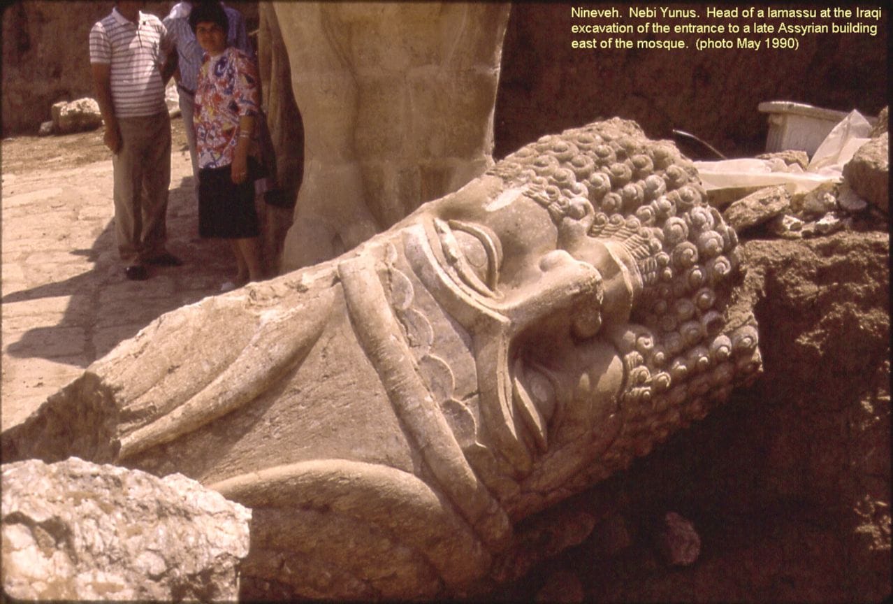 A large a bull-man sculpture being excavated at Niveneh in 1990 (photo via Wikimedia Commons)