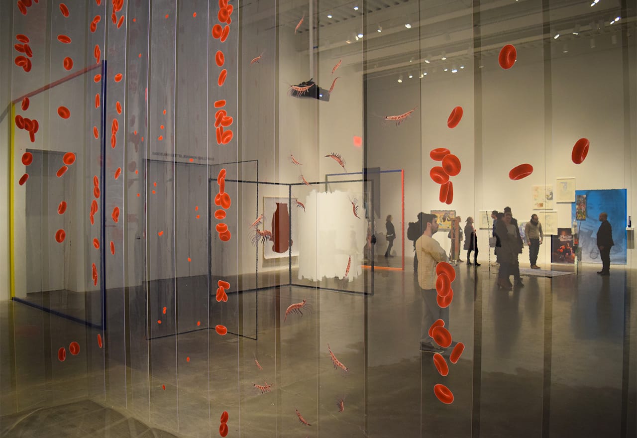Fourth floor installation view of 'Surround Audience' as seen through Aleksandra Domanović's "SOHO (Substances of Human Origin)" (2015)