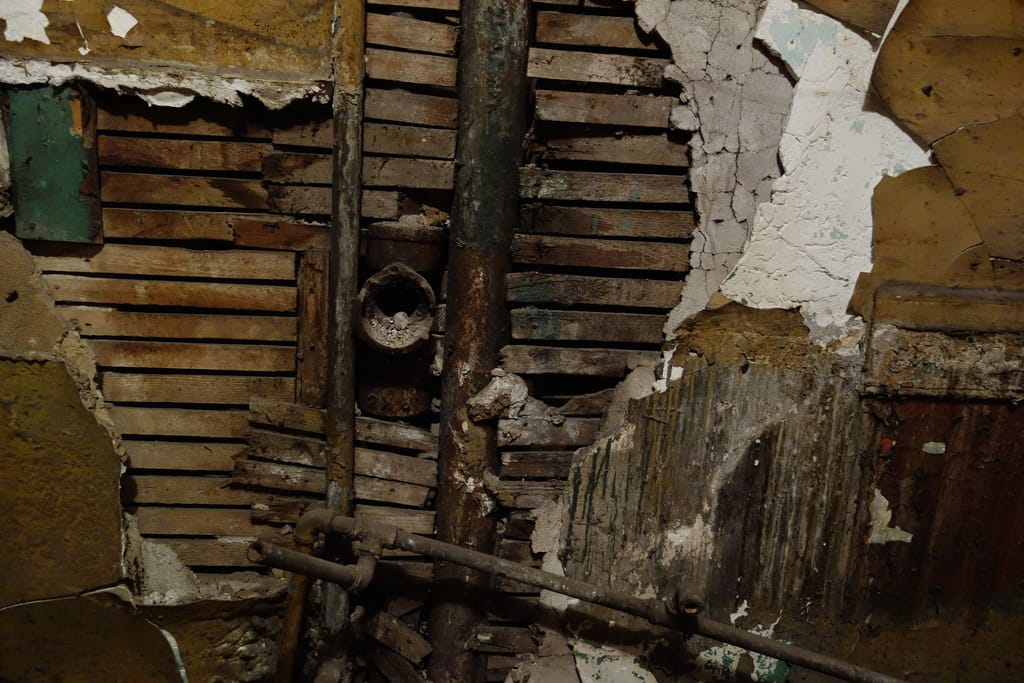 An unrestored section of wall