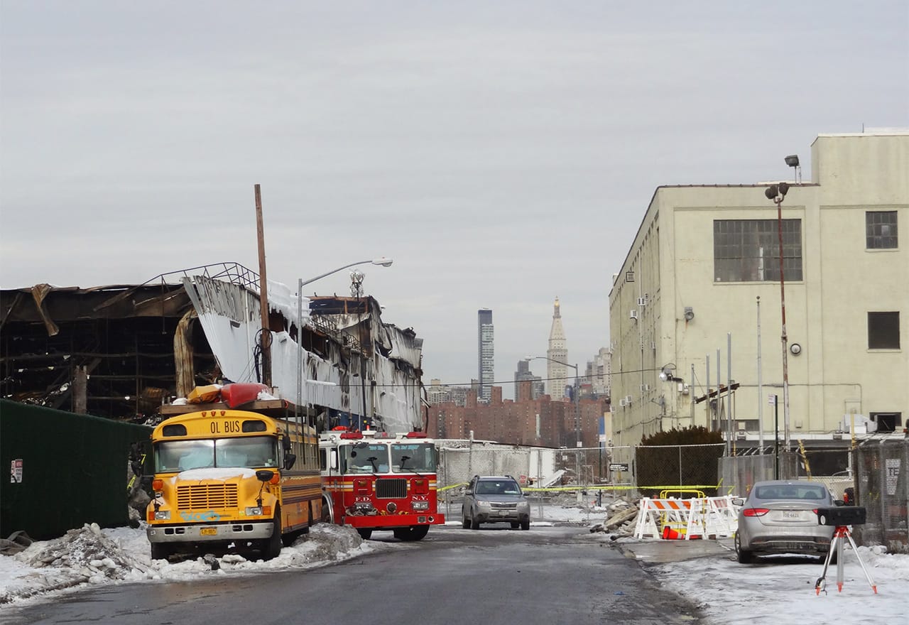 The burnt warehouse and 1 North 12th Street, a building filled with artists', recording, and video production studios