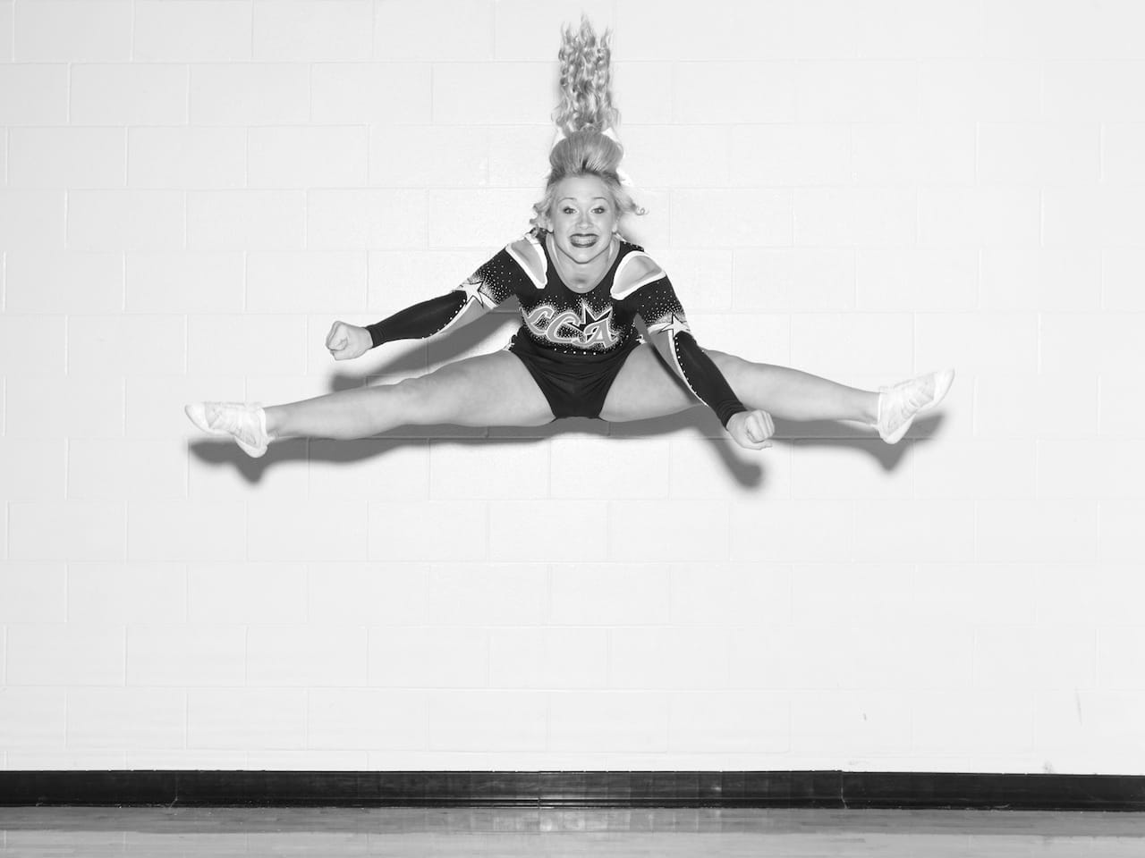 Alec Soth, "Bree, Liberty Cheer All-Stars", Corsicana, Texas, 2012. Pigment print, 39 x 52 inches