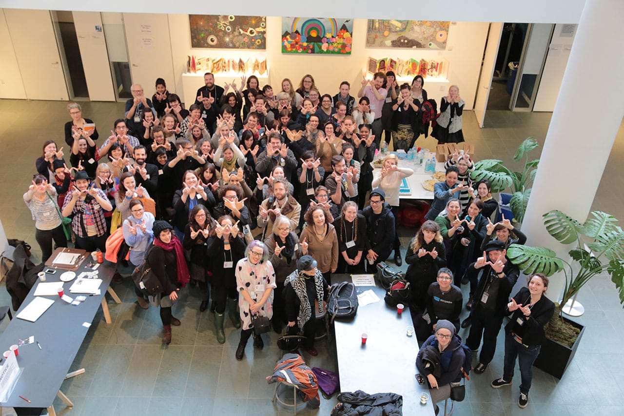 2015 Art+Feminism Wikipedia Edit-a-thon volunteers at MoMA (image via Wikipedia)