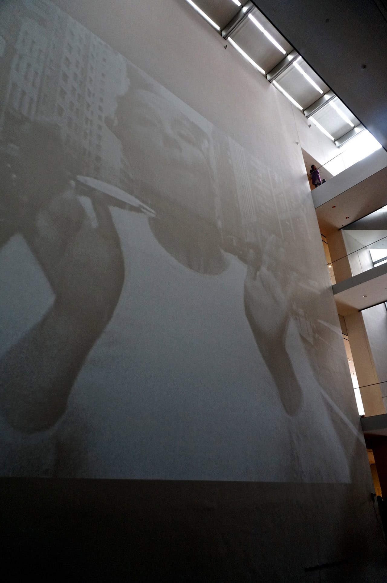 Björk's and director Stephane Sednaoui's "Big Time Gravity" video (1993), projected on a large wall at MoMA