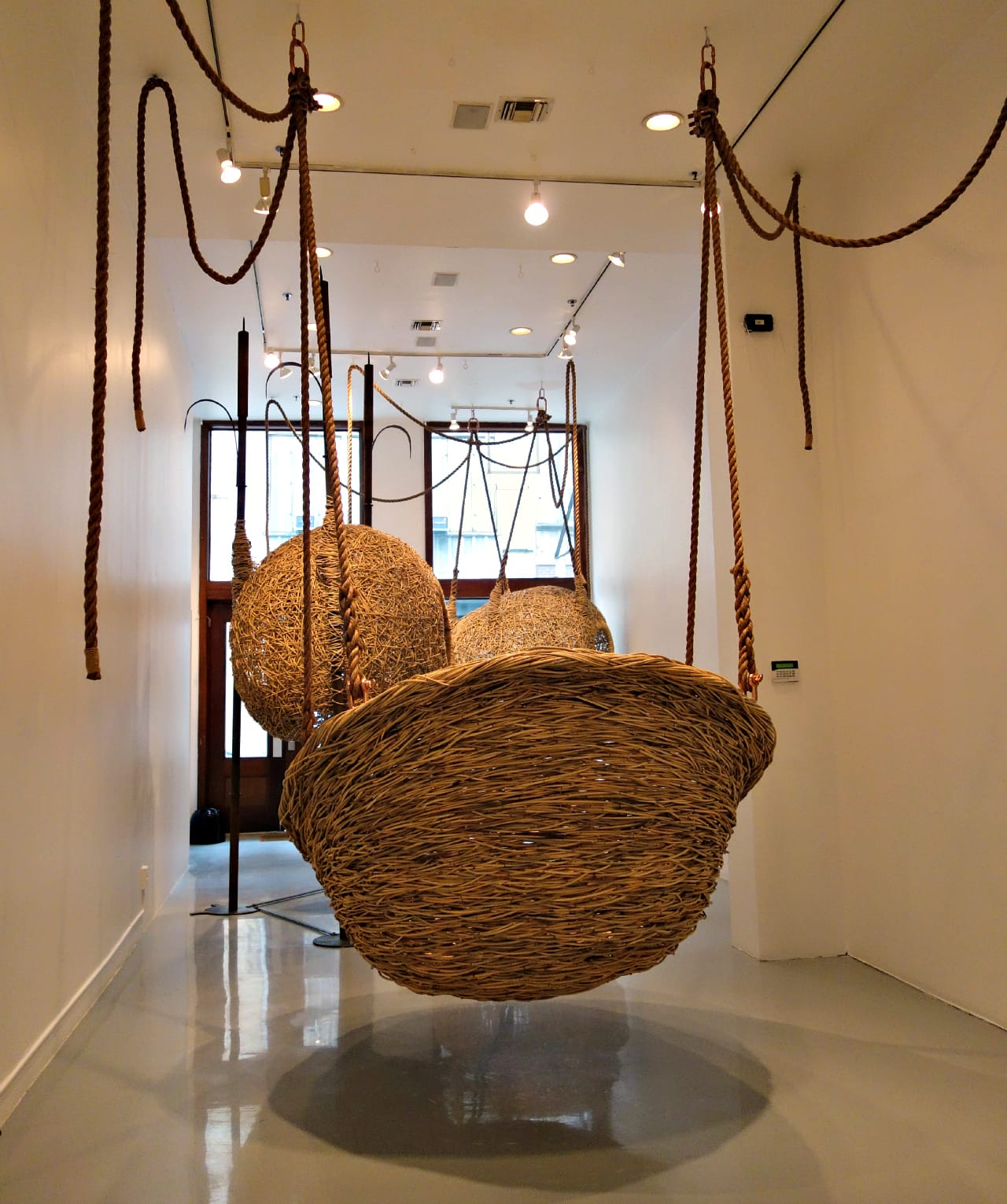 Custom hanging "Nest" sculptures by Porky Hefer
