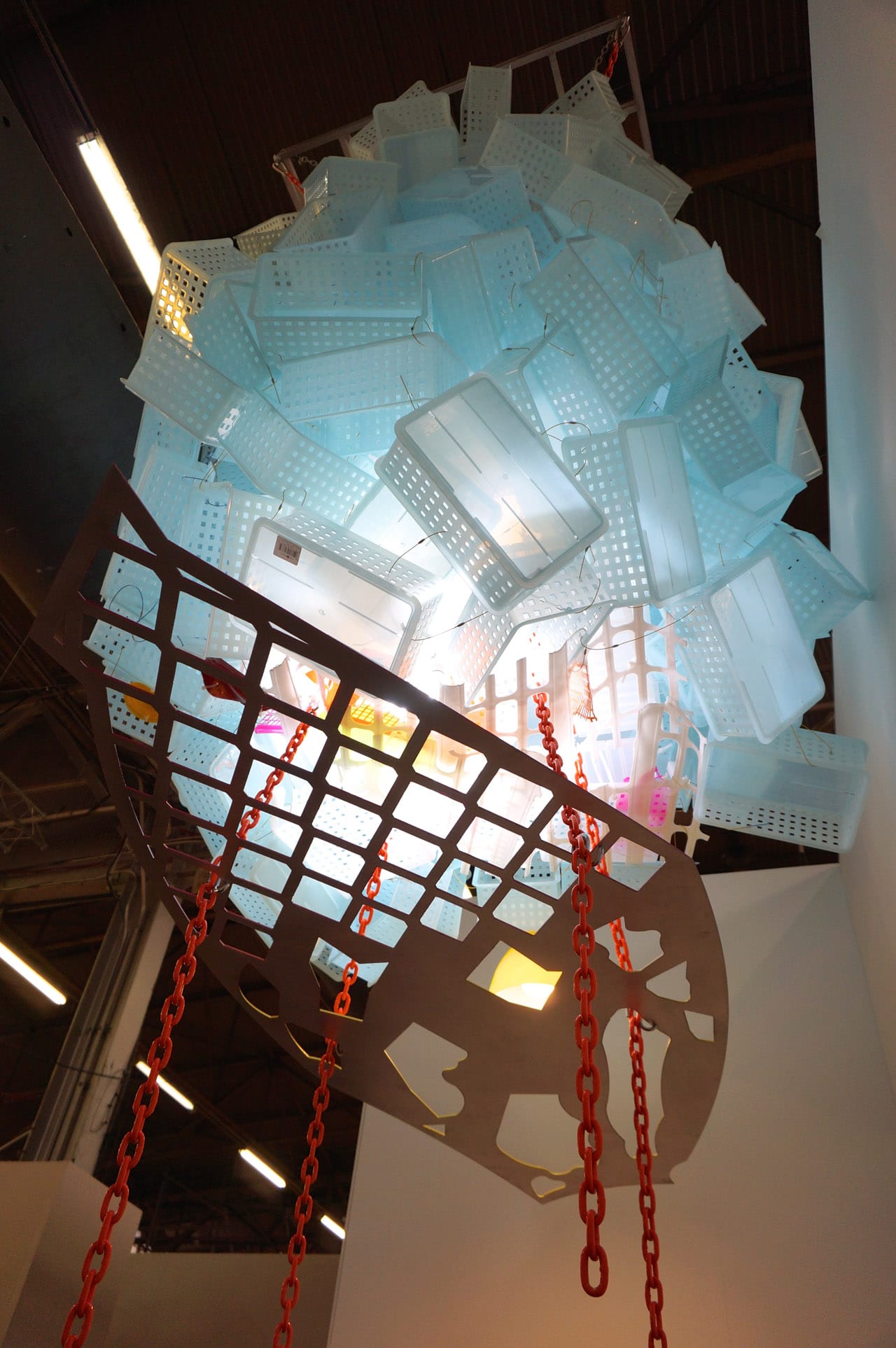 Jessica Stockholder, "Celestial Season" (2015), plastic baskets, wire ties, chain, lights, driveway mirrors, paint, 96 x 70 x 70 in