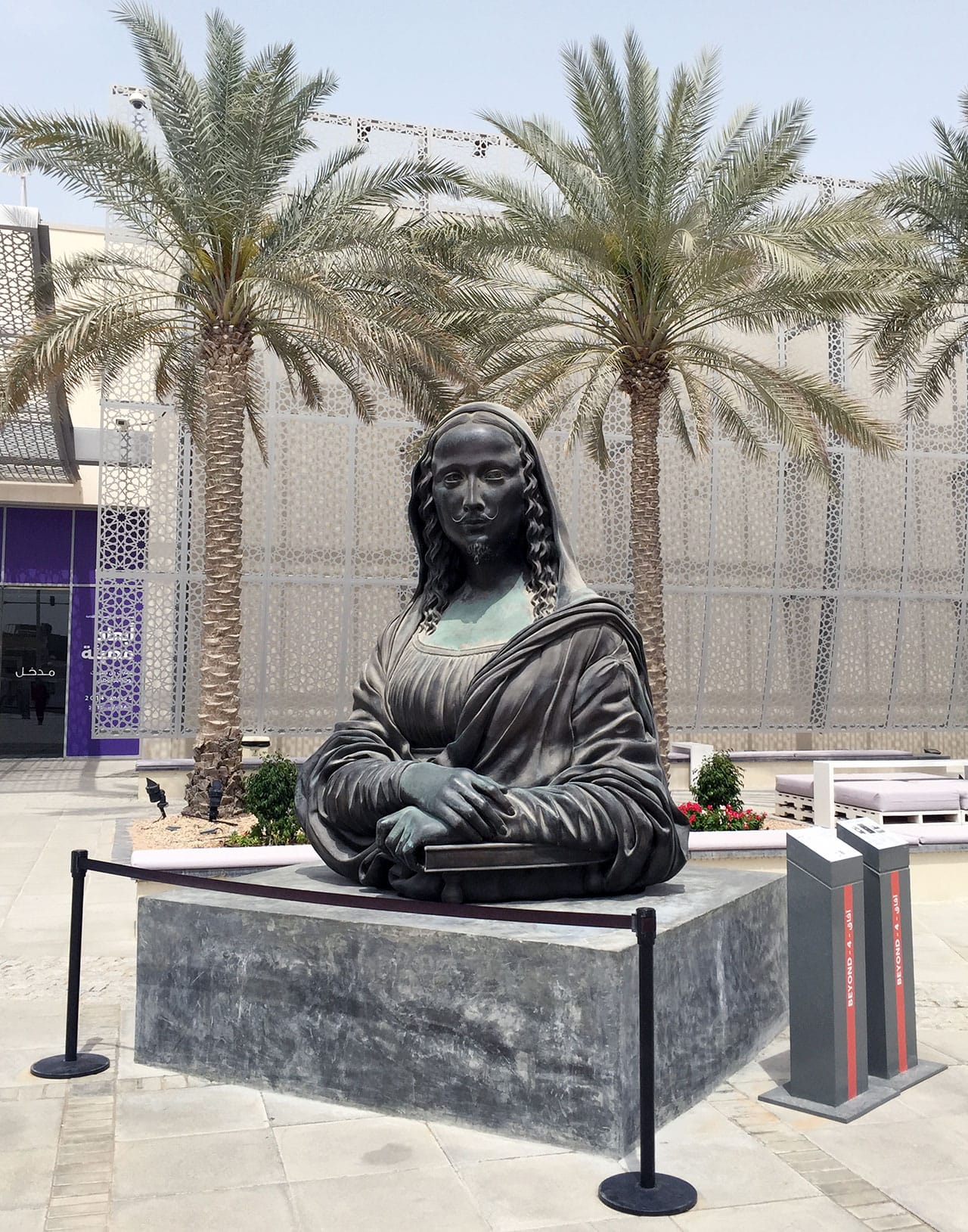 Sudobh Gupta's "Et tu, Duchamp?" (2009/10) in front of the Manarat Al Saadiyat, Saadiyat Cultural District, Abu Dhabi (photo by the author for Hyperallergic)