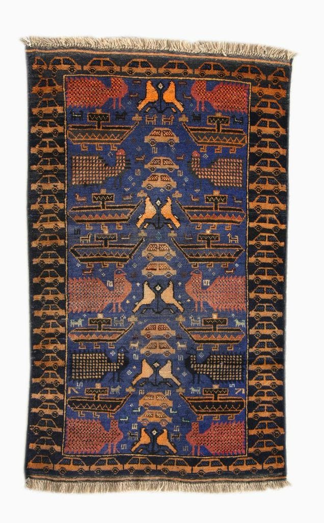 Unknown maker in Western Afghanistan, War Rug with Peacocks, date unknown; acquired in Peshawar, Pakistan, 1994. Knotted wool, 57 1/2 x 33 1/2 inches. Private collection. Image courtesy of SMoCA