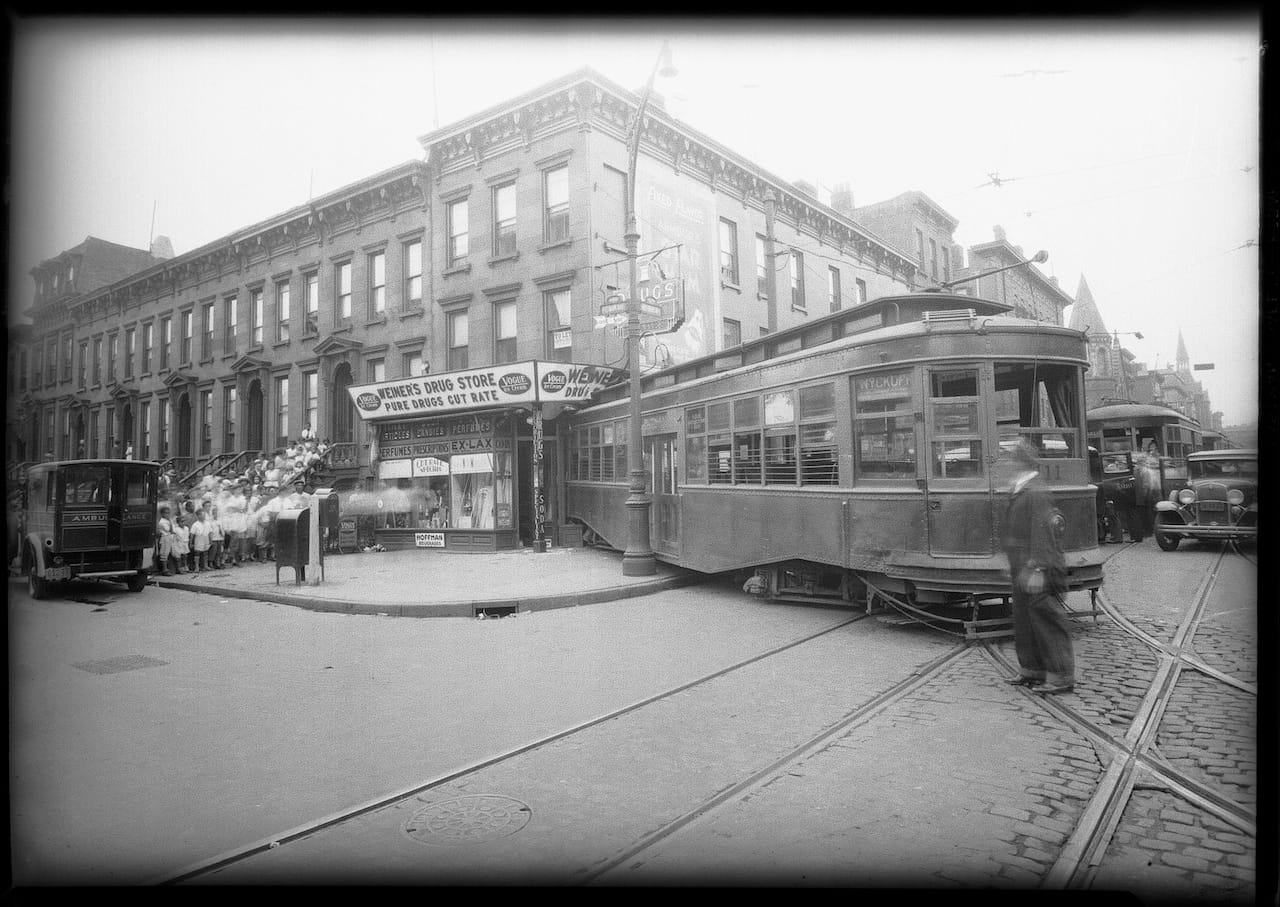 Streetcar that jumped the tracks at Nostrand & Putnam avenues (July 1931) (courtesy New York City Municipal Archives)