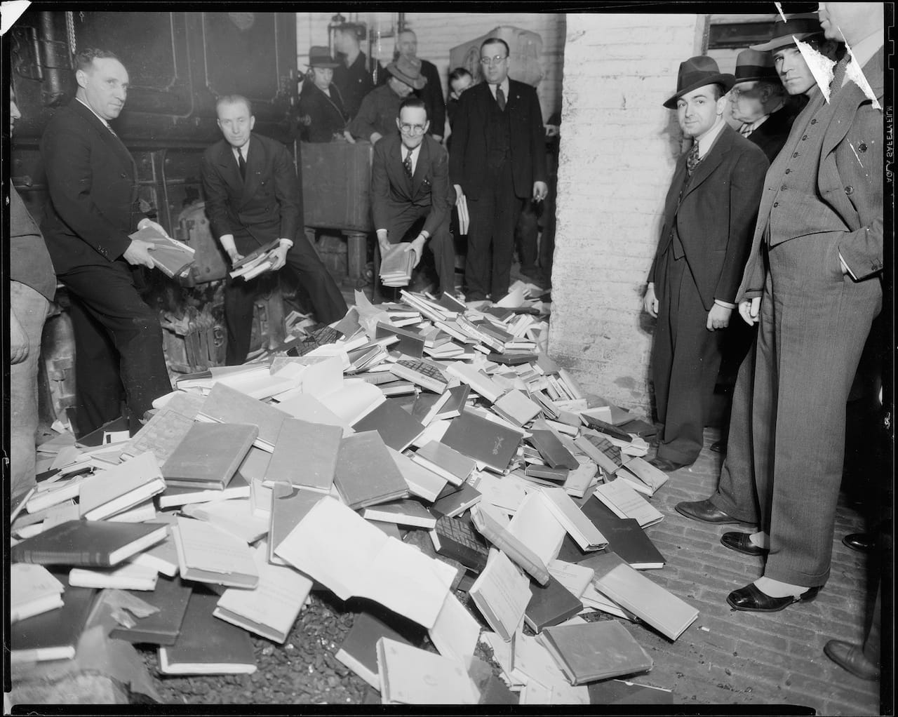 Books designated "indecent" being burned at Manhattan Police Headquarters (1935) (courtesy New York City Municipal Archives)