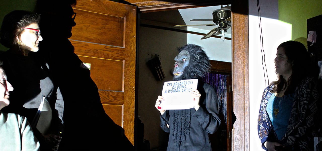 A Guerilla Girl breaks into the 1980s to enumerate “The Advantages of Being  a Woman Artist,” in 'The Modern Woman.'