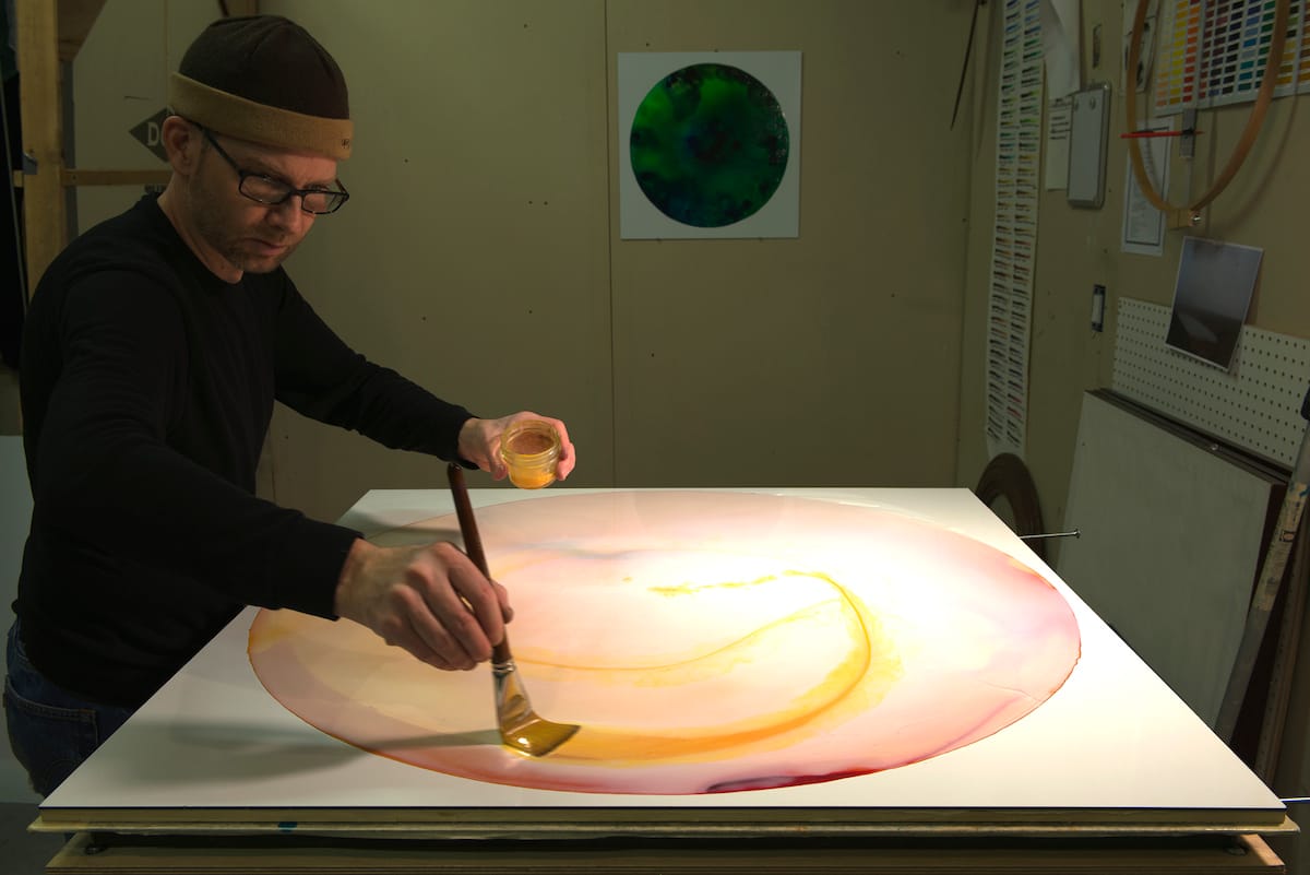 John Sabraw painting with pigments made from toxic river sludge (courtesy John Sabraw)