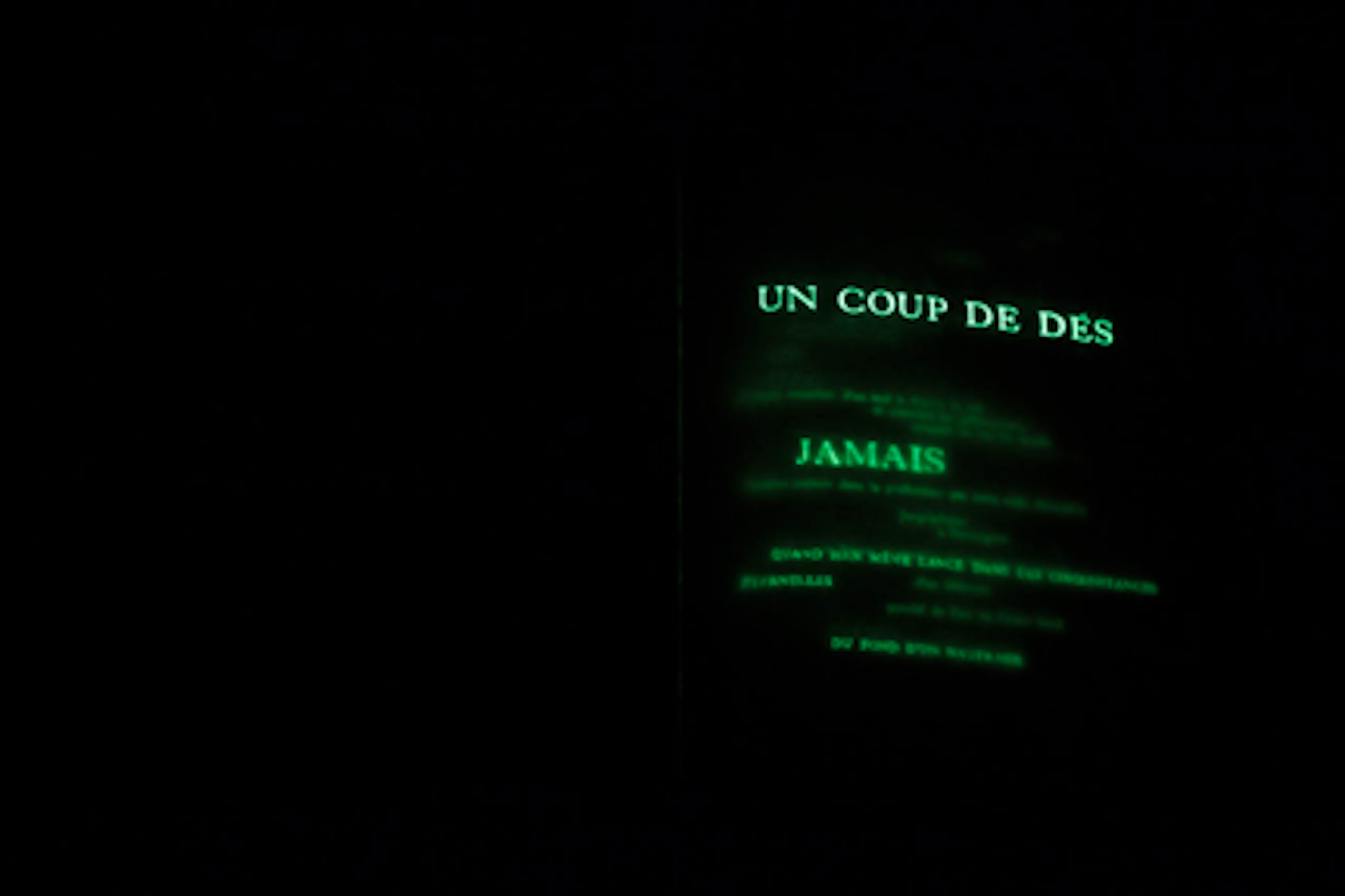 Raffaella della Olga, “Un coup de dés jamais n’abolira le hasard – constellation”  (2009) based on the symbolist poem  Un coup de dés jamais n’abolira le hasard  (A Throw of the Dice will Never Abolish Chance) by Stéphane Mallarmé, éd. Gallimard, 1914, 35 x 50 cm, acrylic white paint and fluorescent powder © Raffaellea della Olga