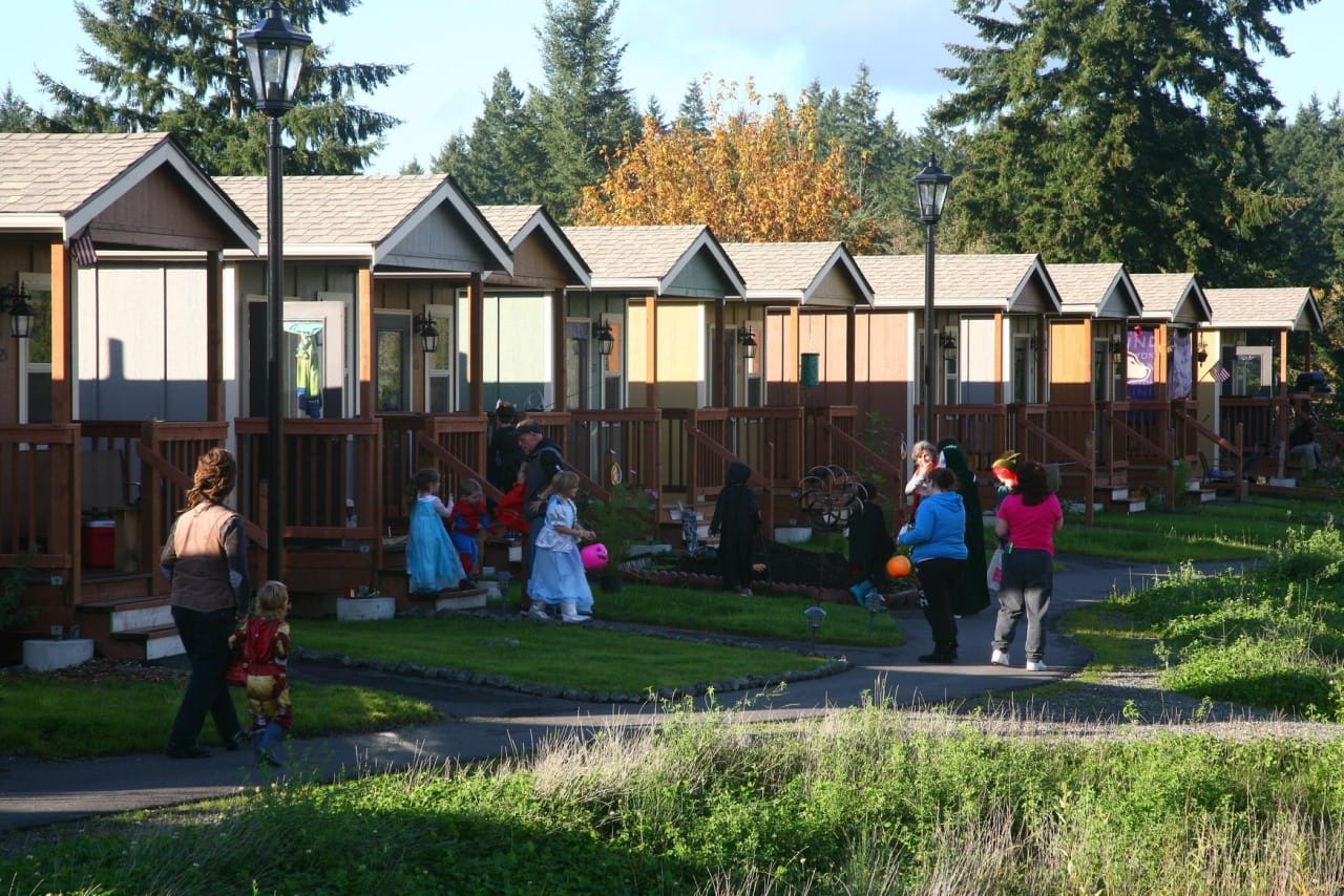 Quixote Village in Olympia, Washington, started out as a protest in a downtown parking lot in 2007, and it now has 30 traditional, 144-square-foot cottages, as well as a vegetable garden, community building, showers, and laundry. Because of a city ordinance, the camp moves from one church parking lot to another every 90 days. 