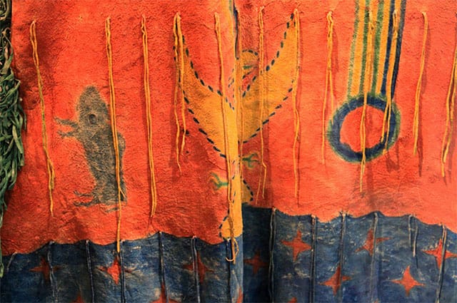 Ghost Dance Dress, Detail, Southern Arapaho artist, Oklahoma, ca. 1890, Native tanned leather, pigment, metal cones, The Nelson-Atkins Museum of Art, Kansas City, Missouri