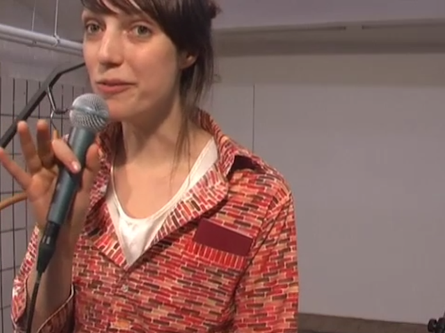 Kasia Fudakowski, "Smile" (2011).  Film and documentation of performance at Chert Gallery 2011 with help from Christopher Fillipini, Tómas Lemarquis, Mathias Droste and Johannes Schroth. Used with permission from the artist.