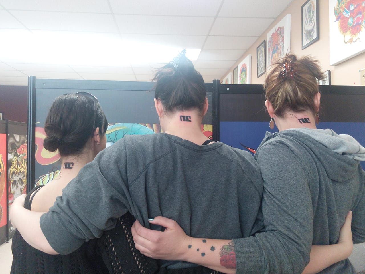 Fans with 'Bitch Planet' tattoos