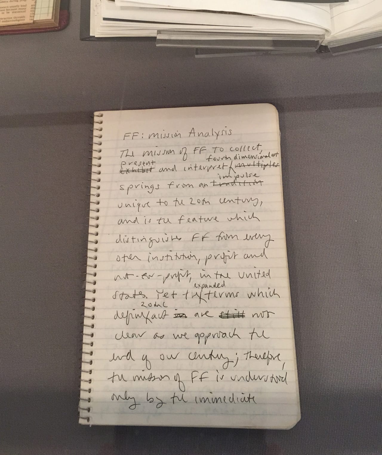 Photo of a notebook of Martha Wilson in which she is working on the mission statement for Franklin Furnace.