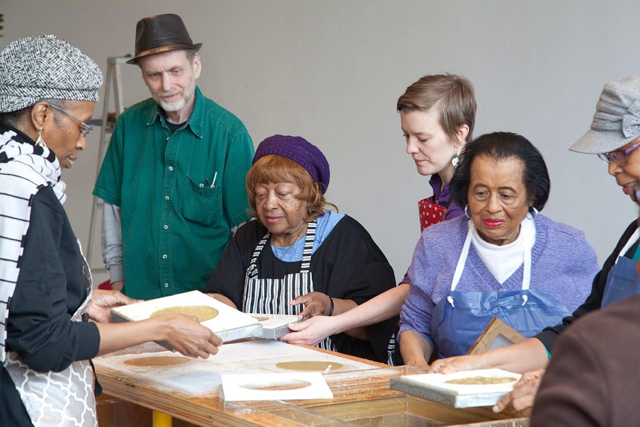 Visitors from the Hannan House http://www.hannan.org, a senior care organization, attend one of Heeres' papermaking workshops. Photo by Paul David Rearick.