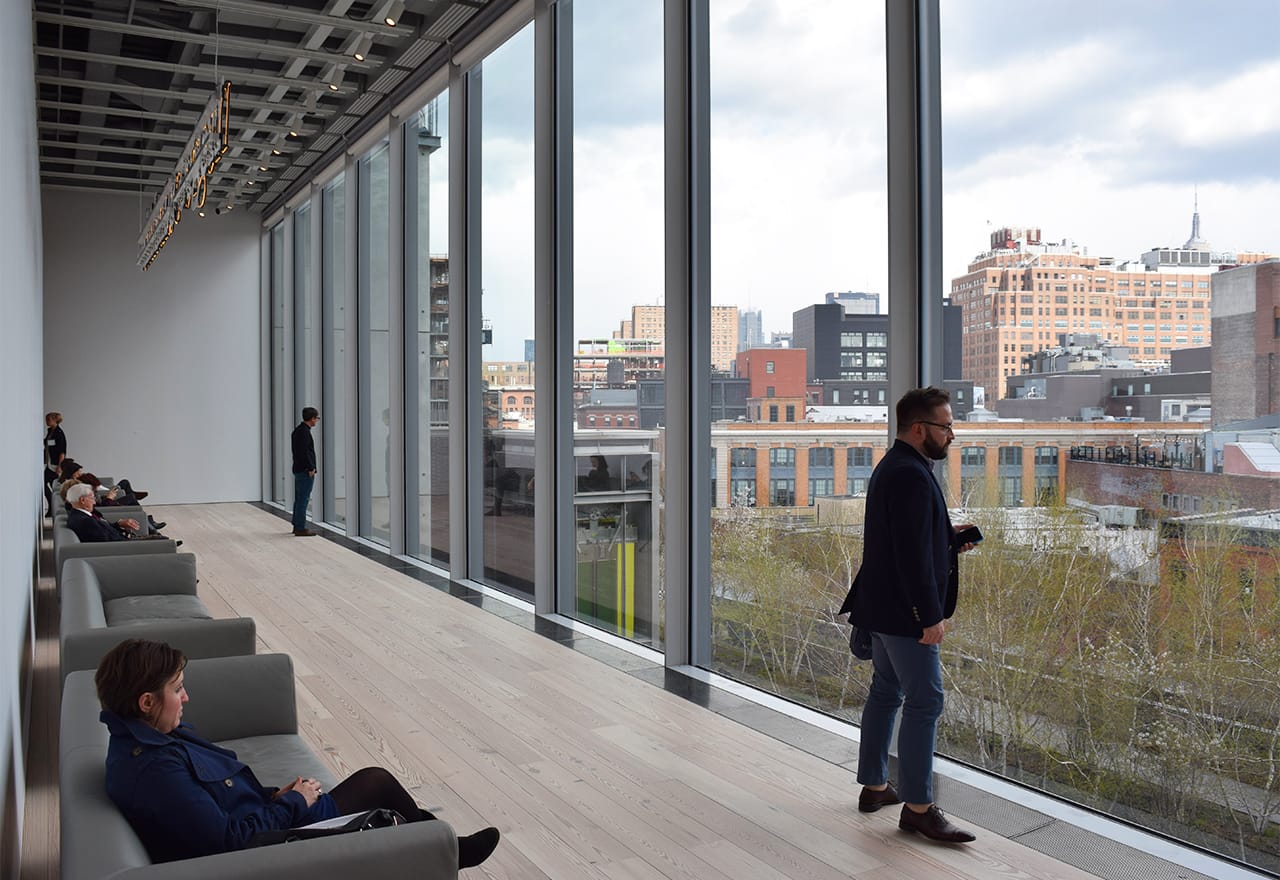 The view from the other end of the fifth floor, where visitors can sit under Glenn Ligon's "Rückenfigur" (2009) and look out toward the High Line