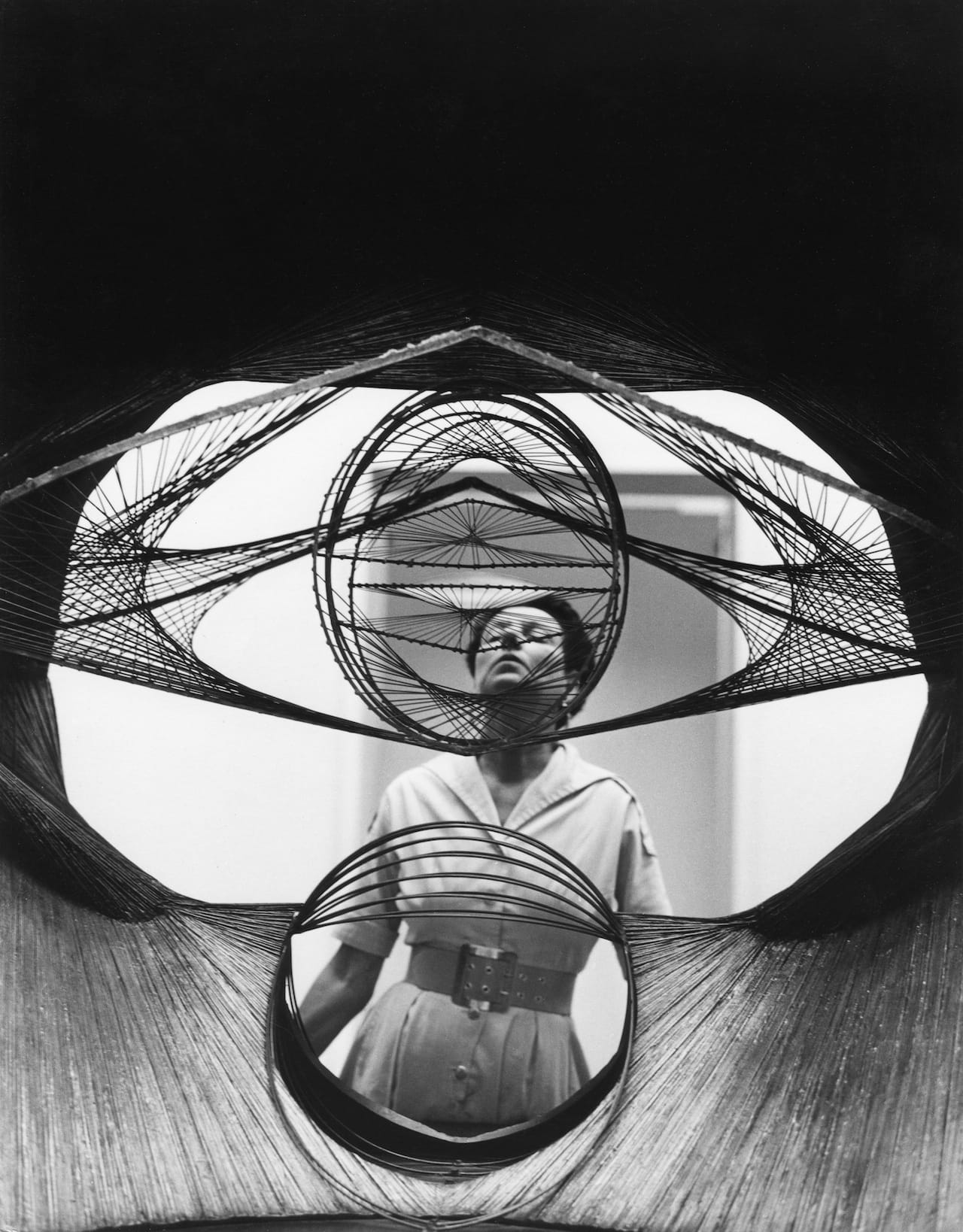 Roloff Beny, Peggy Guggenheim seen through a sculpture (courtesy of National Archives of Canada and Peggy Guggenheim Collection Archives, Venice)