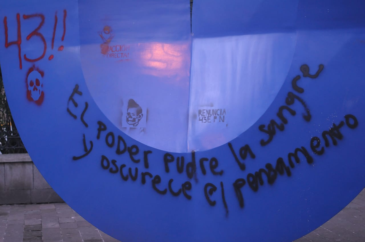 Detail of graffiti on a sculpture by Sebestián at the Museo de Arte Moderno