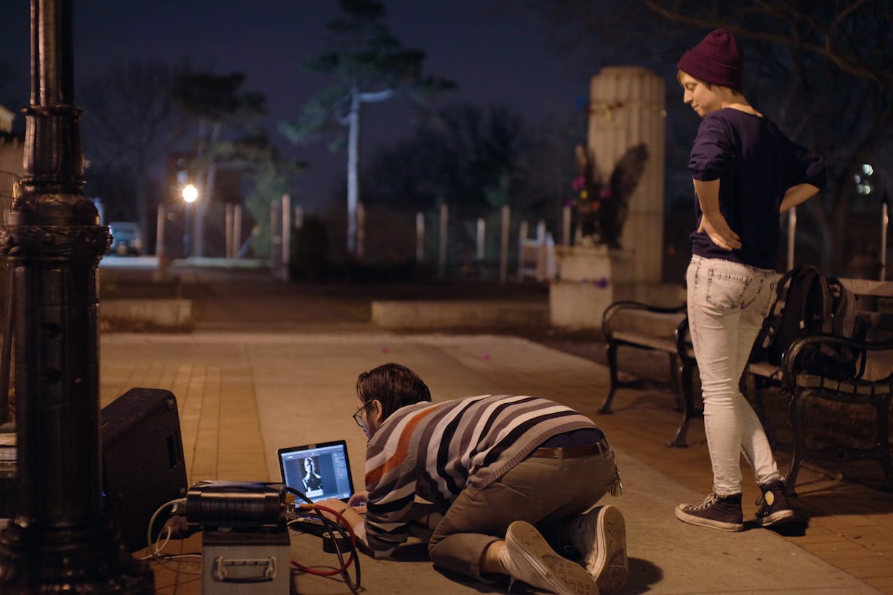 The Illuminator crew sets up