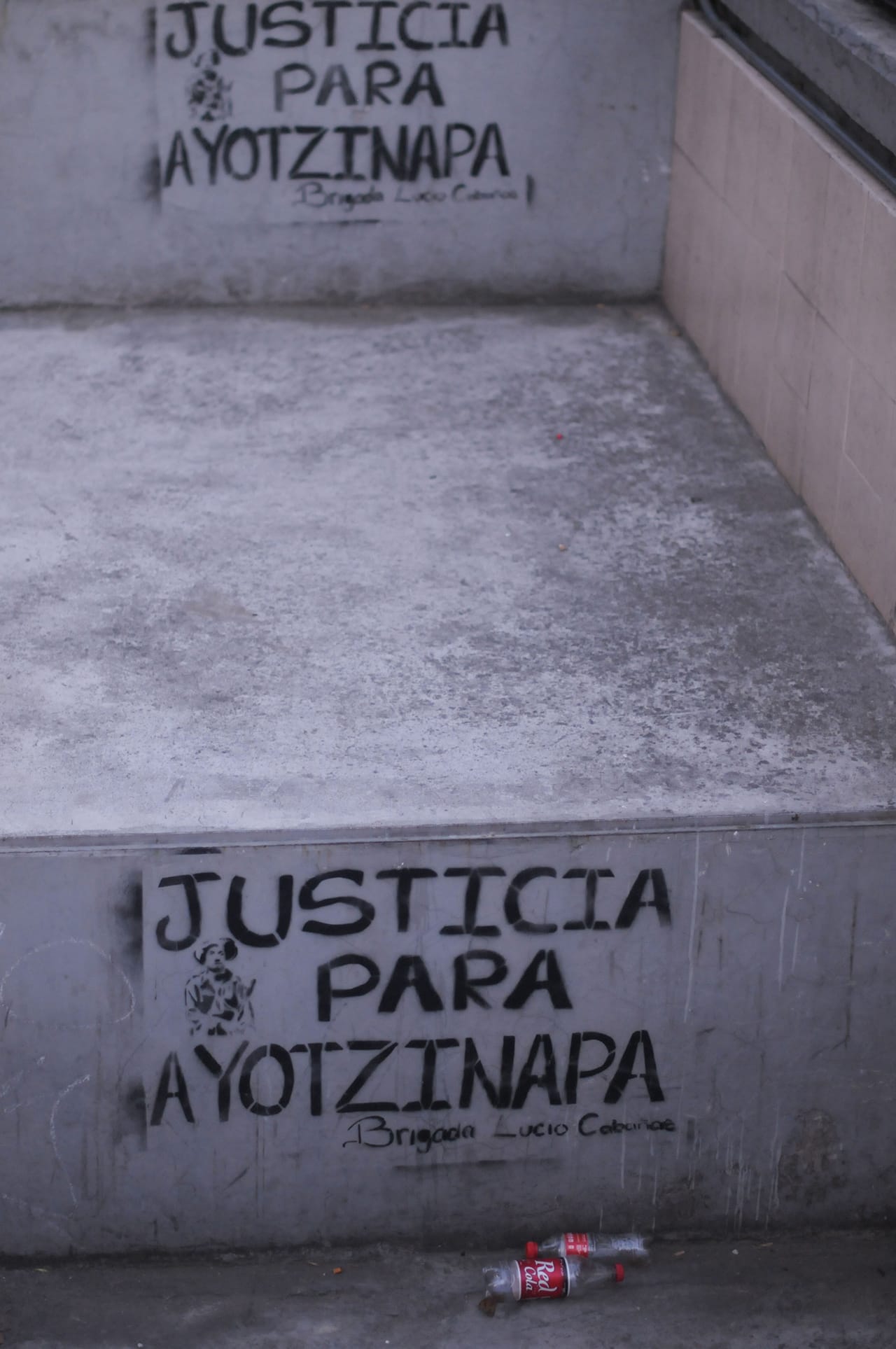 Stencils calling for justice for Ayotzinapa