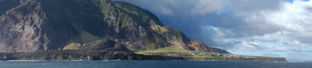 View of Tristan da Cunha, with Edinburgh of the Seven Seas at right (photograph by Brian Gratwicke, via Flickr)